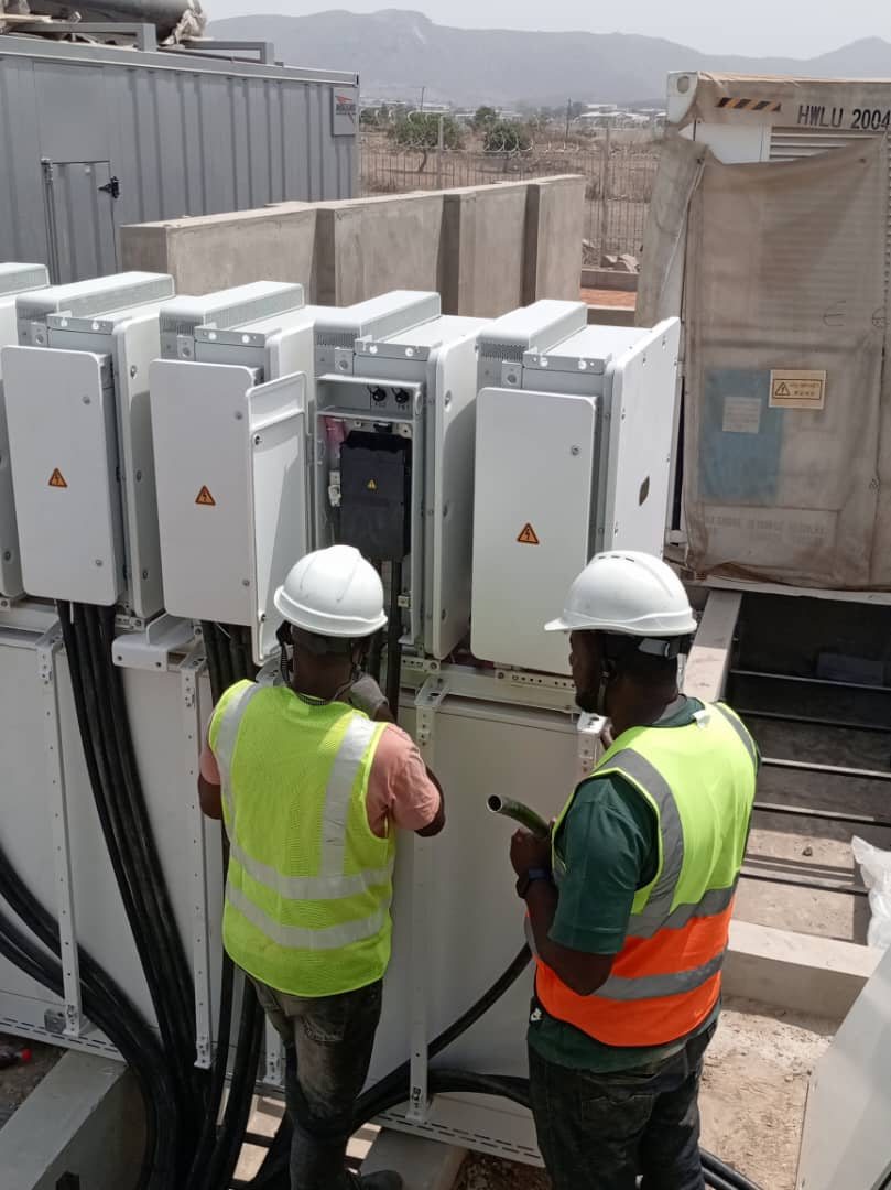 DORMIC engineers commissioning inverters on site